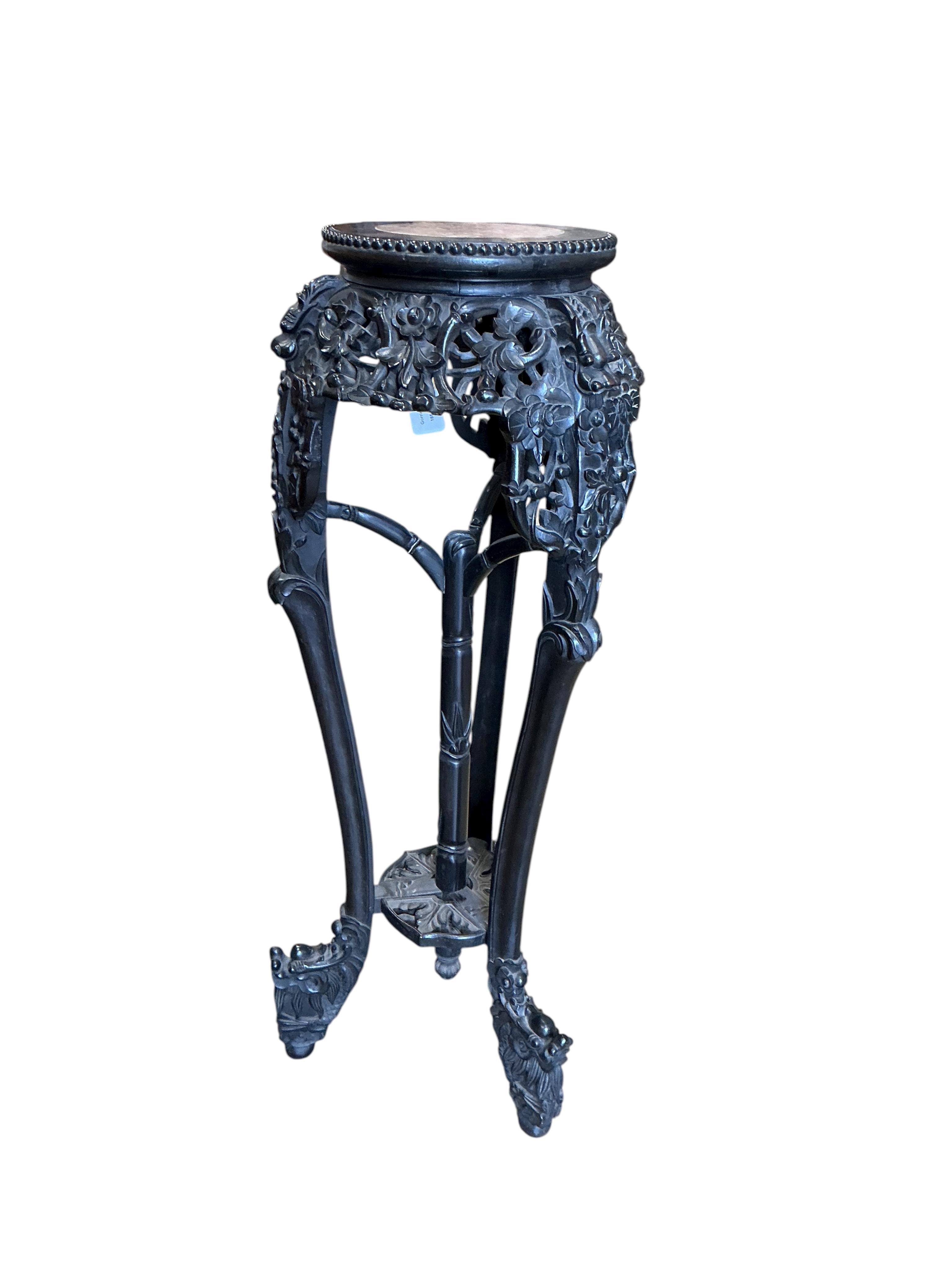 A Chinese marble topped vase stand, diameter 34cm, height 94cm